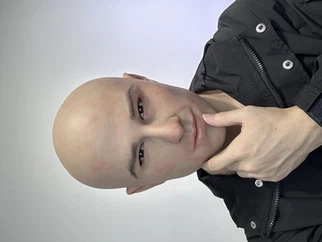 Manlig realistisk mask ung man